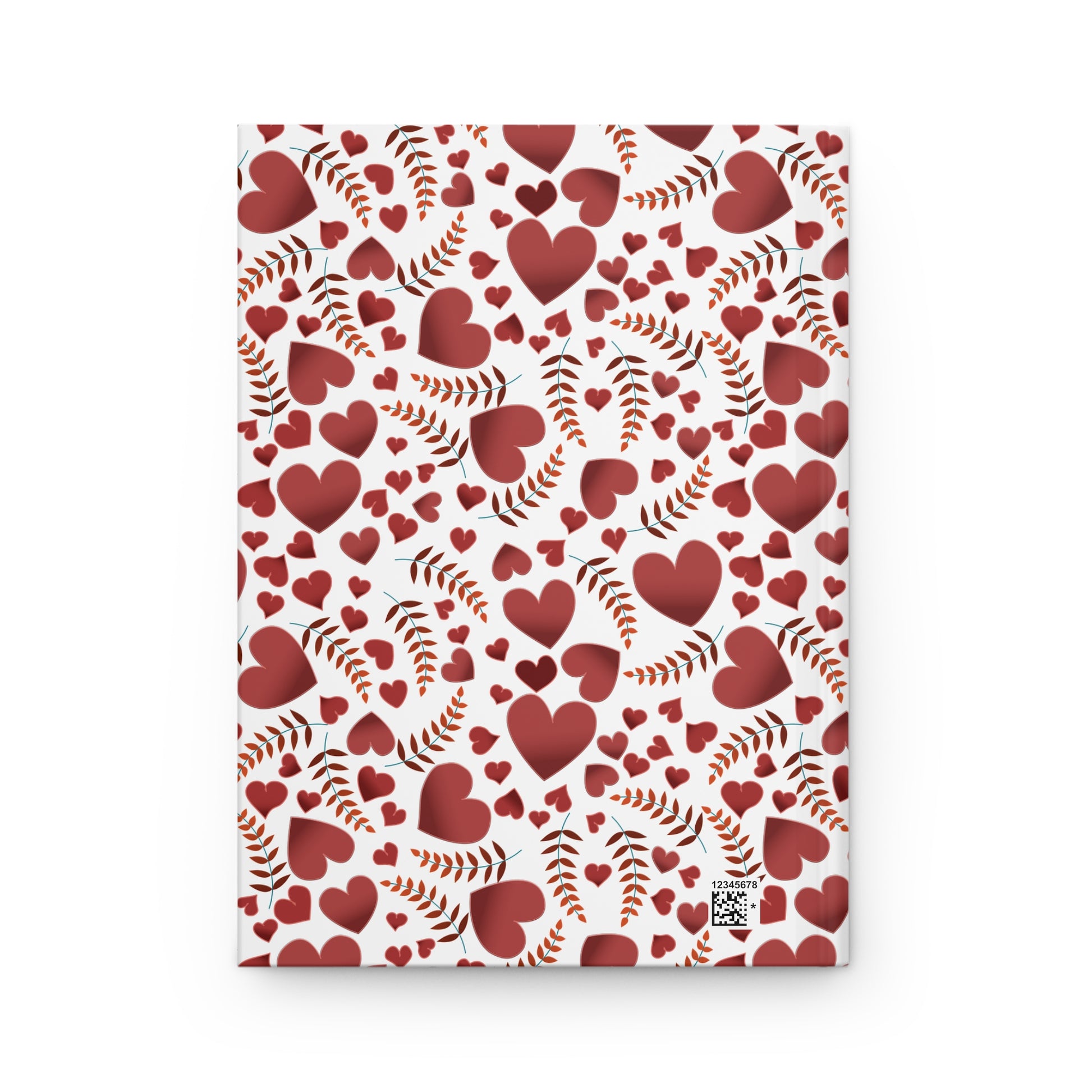 HARDCOVER JOURNAL, MATTE, RULED, 5X7, SEWN BIND, CLEAN-TEAR PAGES – HEARTS: features a vibrant cover with red heart and fern patterns, subtle shadowing, and a small barcode on the back.