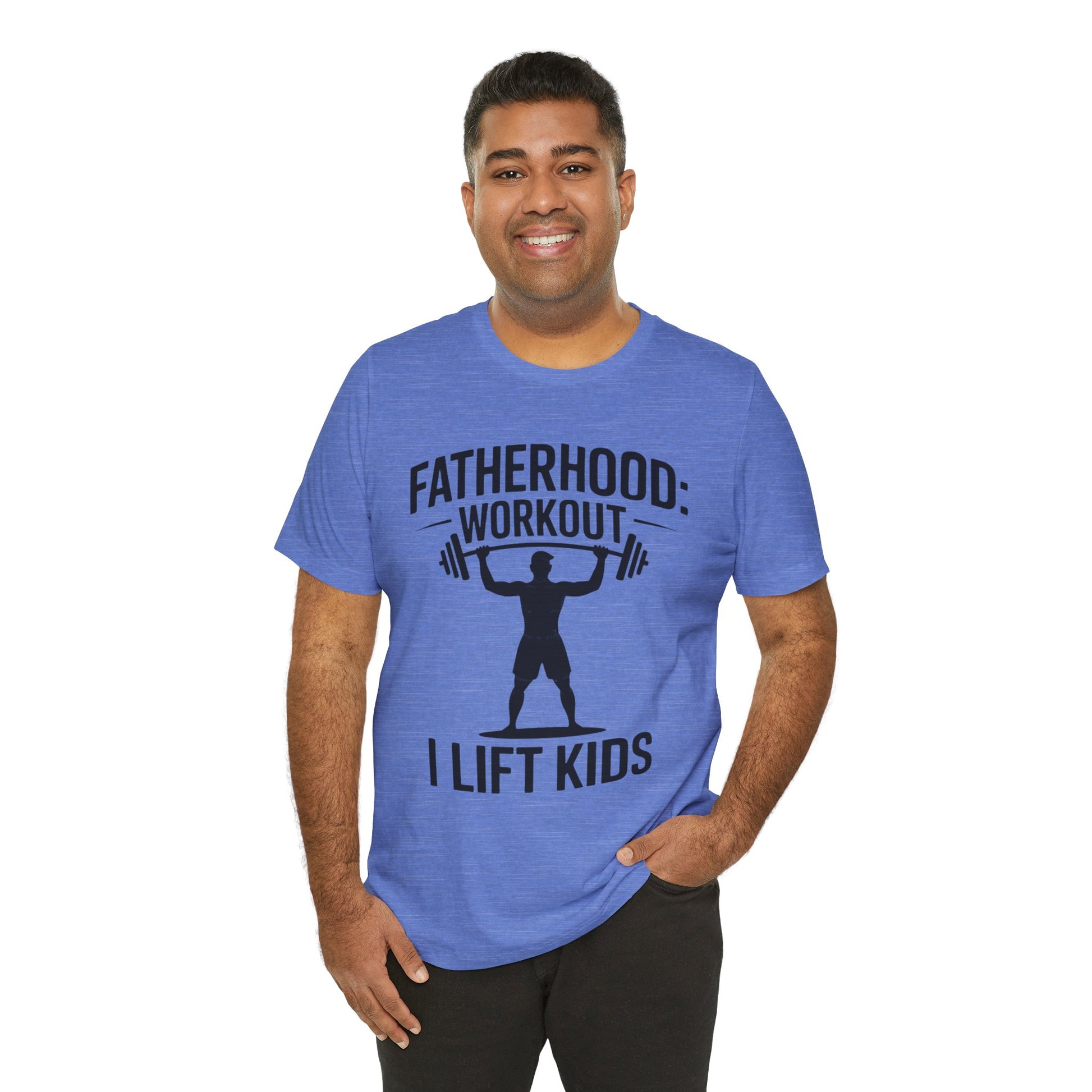 Man in blue shirt smiling, wearing a I Lift Kids Bella+Canvas T-Shirt, reflects playful fatherhood, ideal for casual, joyful occasions.
