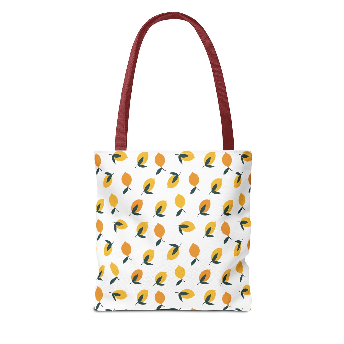 Lemon Drop Toss Tote Bag with a lively lemon motif on a white background, featuring maroon/red straps. Ideal for joyful outings, embodying FireBrook Designs' cheerful and practical style.