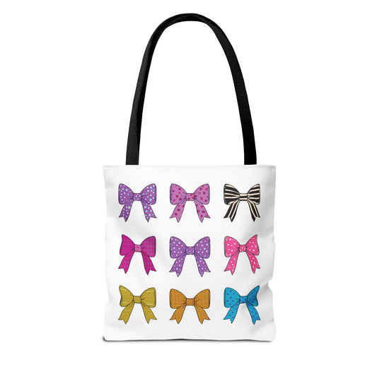 Bows Ribbons Tote Bag featuring colorful bow patterns, offers style and practicality with spacious design and durable polyester body, perfect for daily adventures. Ideal for fashion-forward individuals seeking functionality.