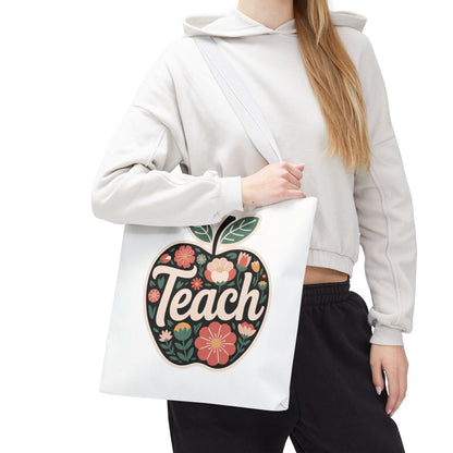 Floral Apple Tote Bag - Hand-Drawn Pastel-Colored Design with 'TEACH', showcasing a cheerful apple shape filled with floral illustrations, ideal for educators. Durable polyester body with reinforced handles, available in multiple sizes.