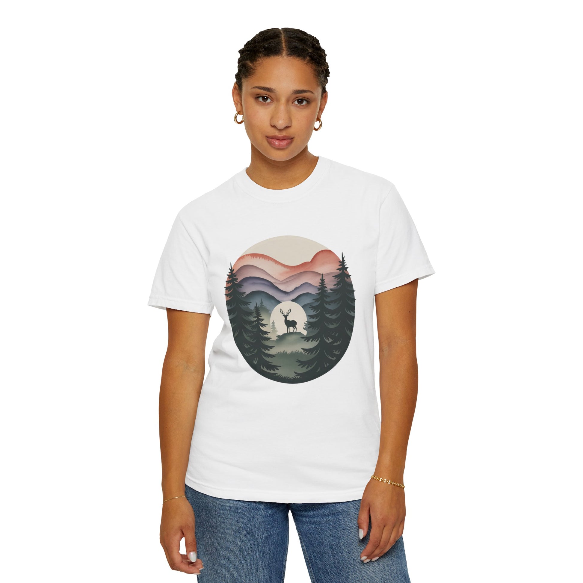 Nature Wanderer T-Shirt features a serene pine forest silhouette with indigo-to-lavender mountains, a celestial moon, and a minimalist stag, embodying wilderness tranquility for nature lovers and outdoor enthusiasts.