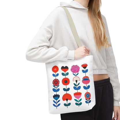 Floral Pattern Tote Bag: Woman holding a white tote with vibrant floral design, ideal for everyday use, embodying style and functionality from FireBrook Essentials.