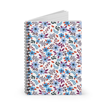 Floral Spiral Notebook with a vibrant floral pattern on the cover, showcasing open blank lined pages for creative note-taking or journaling, featuring a sturdy metal spiral binding for easy page turning.