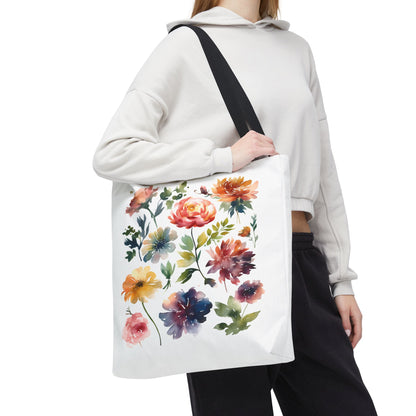 Watercolor Floral Tote Bag held by a woman, showcasing its artistic flower design, perfect for everyday use with reinforced handles and spacious interior.