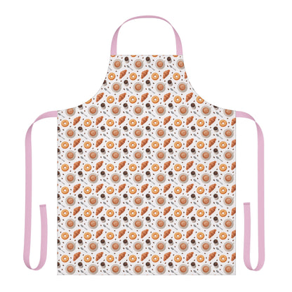 Apron Coffee Cups Donuts Croissants Beans Spoon: Close-up of a white apron with pink straps, featuring playful designs of coffee cups, donuts, croissants, beans, and spoons, crafted for comfort and joyful kitchen moments.