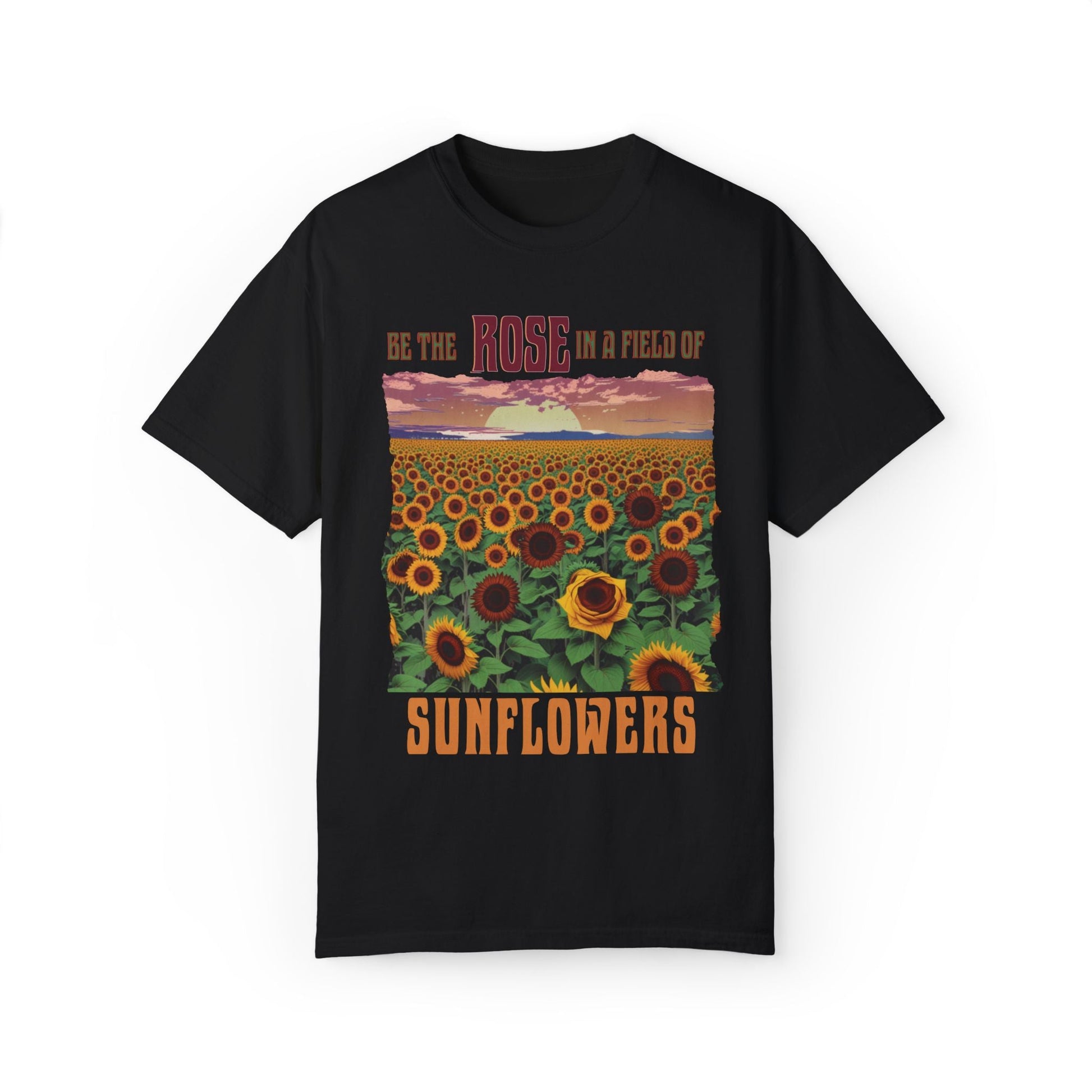 The 'Be the Rose in a Field of Sunflowers T-shirt' features an uplifting quote, double-needle stitching, and garment-dyed softness, exemplifying FireBrook Essentials' commitment to comfort and positivity in everyday wear.