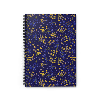 Floral Spiral Notebook with a dark navy cover featuring golden yellow and blue leafy sprigs, bound by sleek metal spirals on the left, ideal for students and creatives alike.