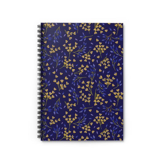Floral Spiral Notebook with a dark navy cover featuring golden yellow and blue leafy sprigs, bound by sleek metal spirals on the left, ideal for students and creatives alike.