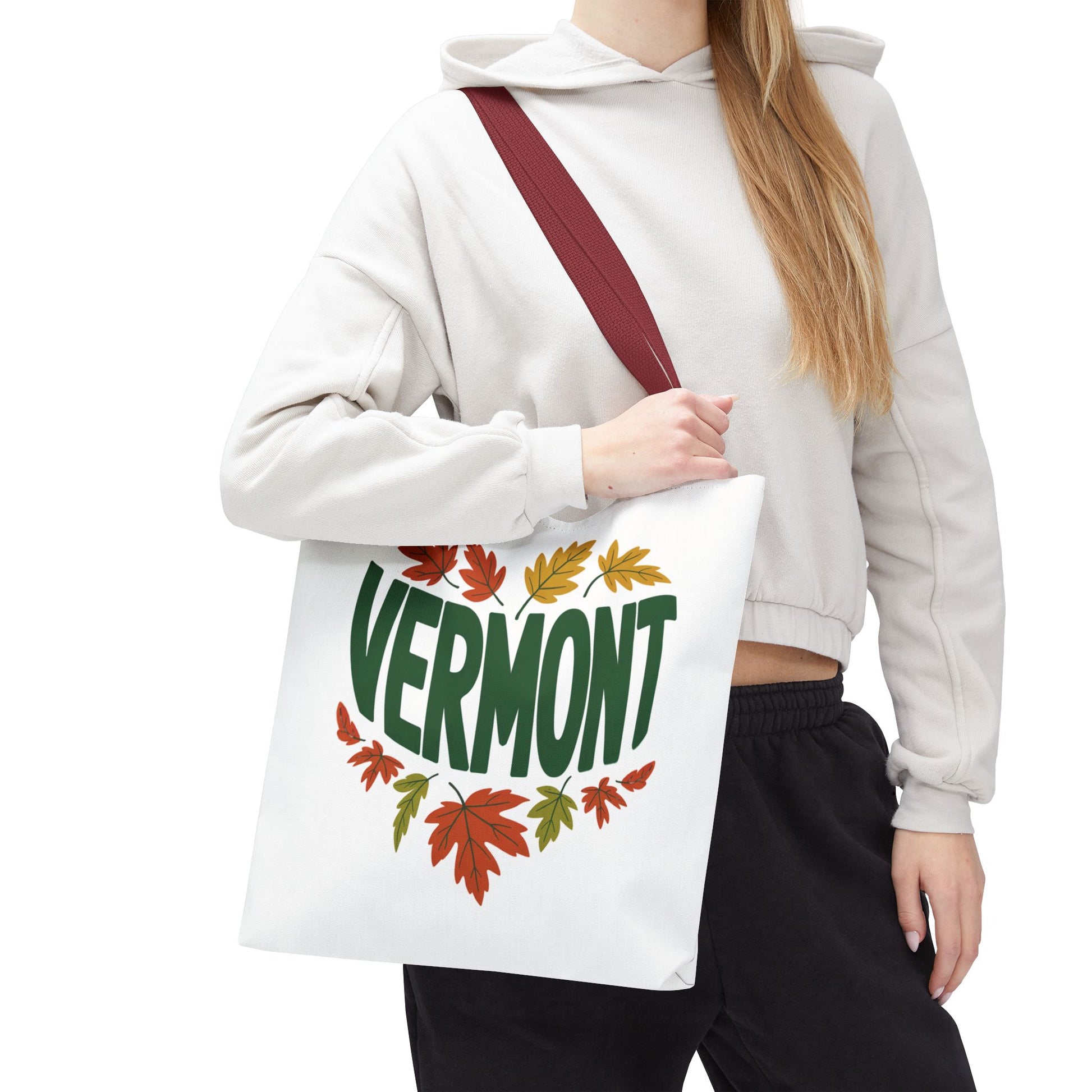 Close-up of a person holding the Vermont Tote Bag, showcasing its sturdy construction with reinforced stitching and boxed corners, ideal for everyday essentials. The bag reflects FireBrook Essentials' blend of style and durability.