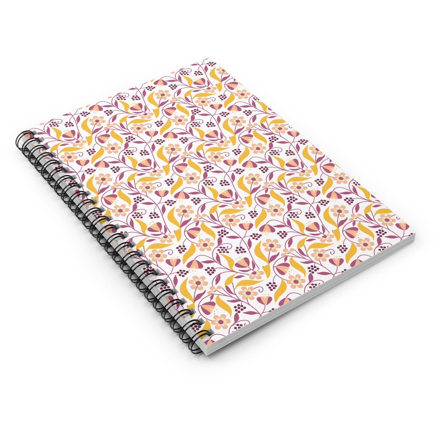 Floral Spiral Notebook featuring a soft pink, coral, and mustard-yellow botanical pattern on the cover, exemplifying FireBrook Designs' joyful and uplifting style, perfect for creative expression and organization.