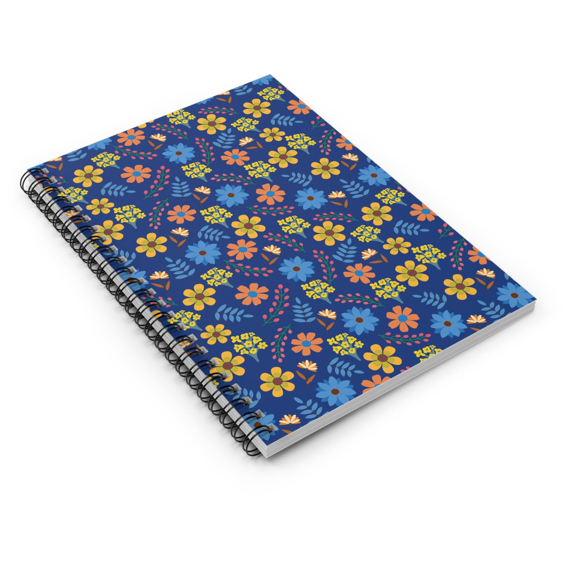 Floral Spiral Notebook featuring a vibrant floral pattern with yellow, orange, and light blue accents on a deep blue cover, bound with a sleek black spiral. Perfect for creative note-taking and organization.