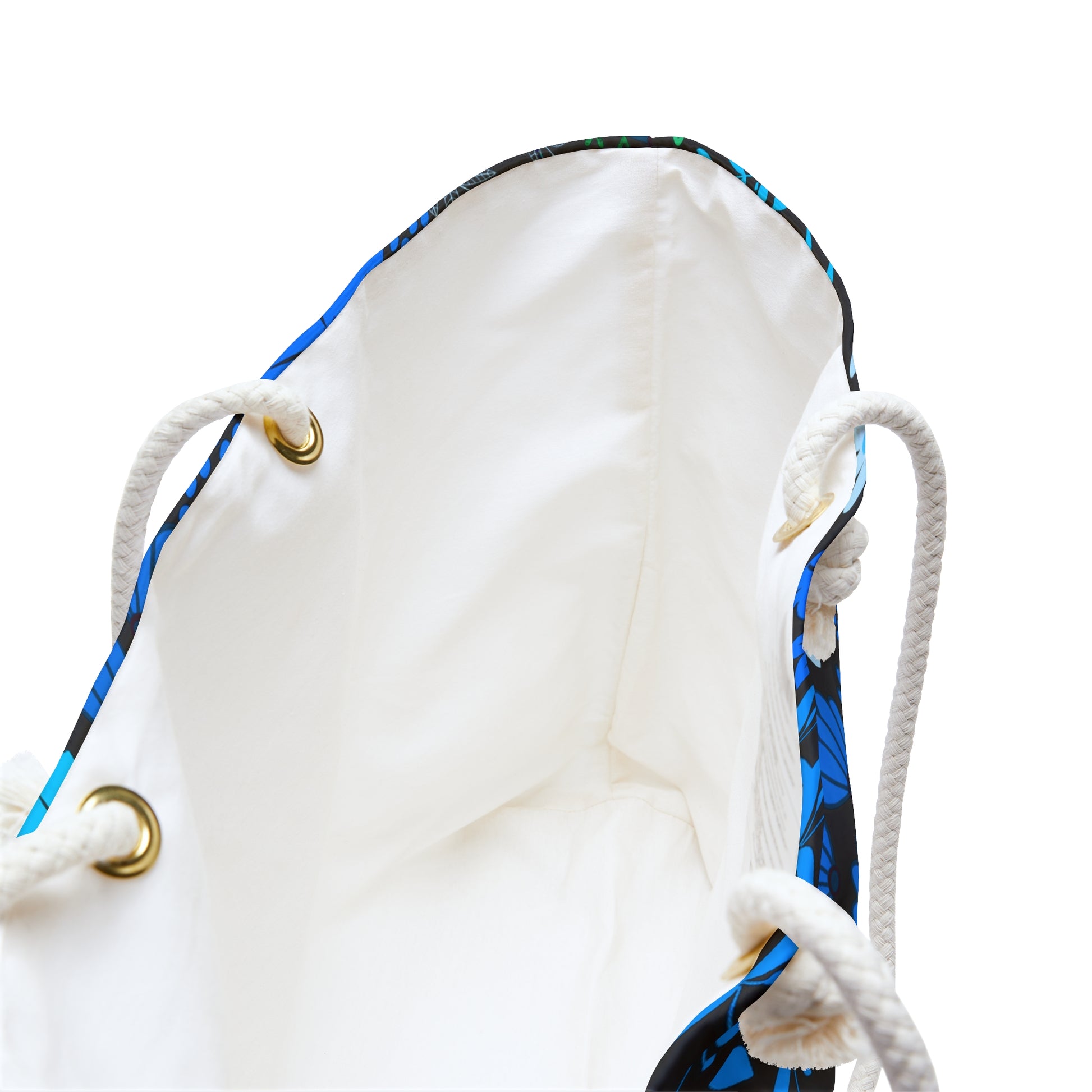Floral Weekender Bag with spacious off-white interior and durable braided rope handles through brass-tone grommets, showcasing FireBrook Designs' commitment to stylish, practical, and uplifting travel essentials.