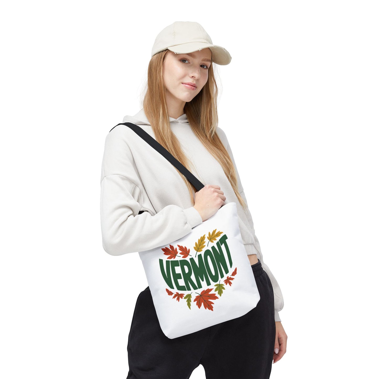Close-up of a woman holding the Vermont Tote Bag, showcasing its durable design with reinforced stitching and boxed corners, ideal for everyday use, available from FireBrook Essentials.