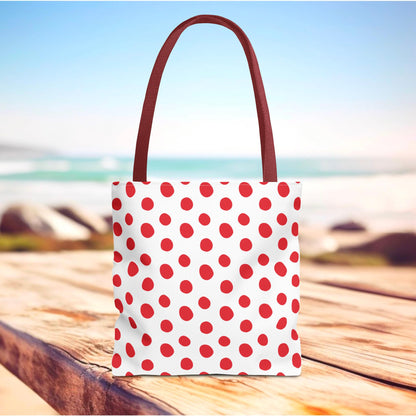 Red Polka Dots Tote Bag with a vibrant design, featuring red and white polka dots. Ideal for everyday use, this bag from FireBrook Designs combines style and practicality with durable construction and reinforced handles.