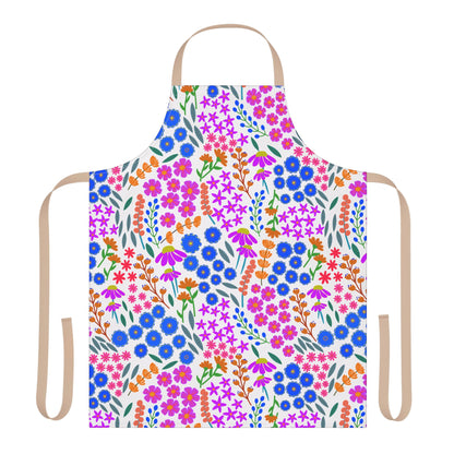 Floral Apron featuring a vibrant, stylized floral pattern with clusters of blue, pink, and orange flowers. It includes a looped neck strap and tan waist ties for a comfortable fit.