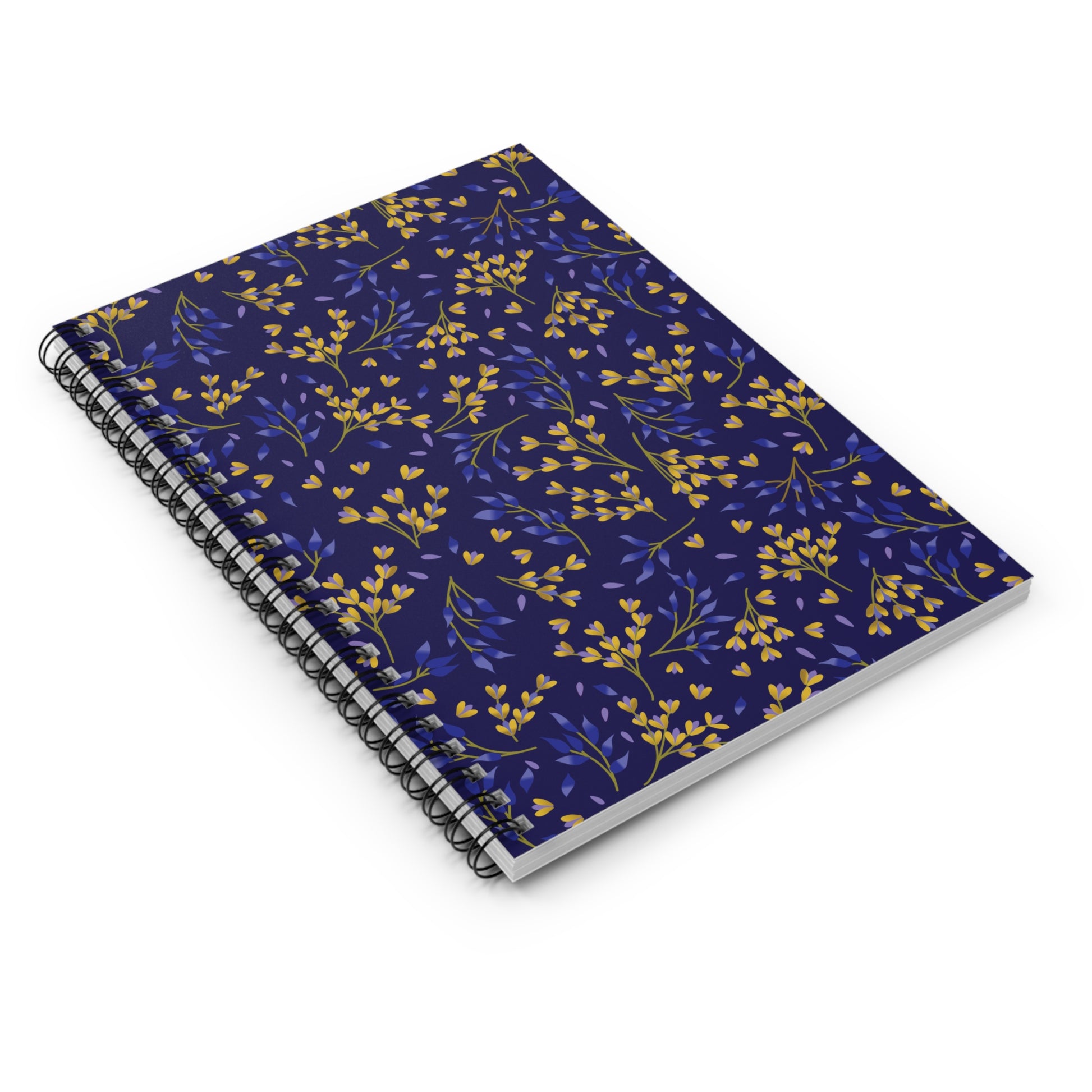 Floral Spiral Notebook with a navy cover adorned with yellow and violet-blue botanical motifs. Features durable black metal binding, ideal for creative note-taking and journaling. Perfect for students and professionals.