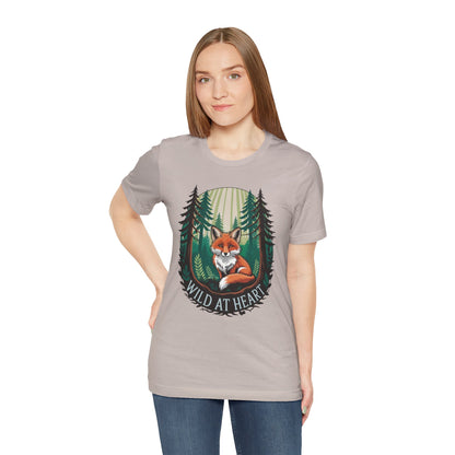 Wild at Heart Fox Illustration Bella+Canvas Unisex T-Shirt featuring a woman wearing the tee with a whimsical fox design. Ideal for casual outings, embodying comfort and style from FireBrook Essentials.