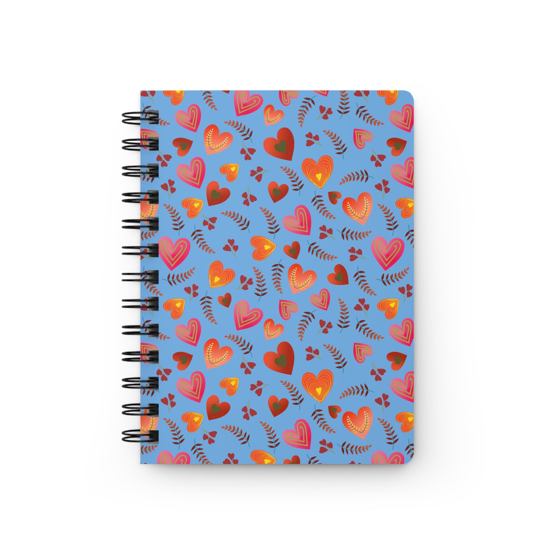 SPIRAL JOURNAL, DURABLE GLOSSY COVER, RULED, 5X7 featuring a heart-and-foliage pattern. Includes a removable spiral, 150 lined pages, and a vibrant, glossy laminated finish for durability.