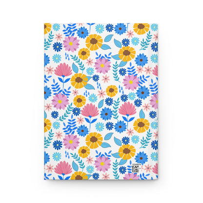 HARDCOVER JOURNAL, MATTE, RULED, 5X7, SEWN BIND, CLEAN-TEAR PAGES – CHEERFUL BLOOMS MIX features a vibrant floral pattern with yellow, pink, lavender, and blue flowers, embodying FireBrook Designs' uplifting style.