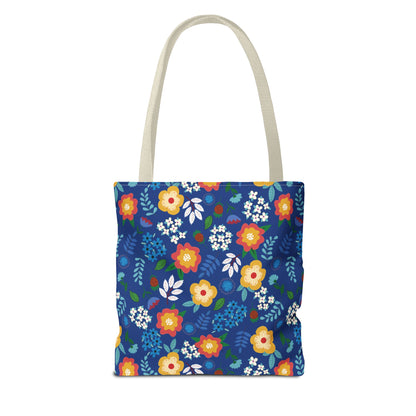 Floral Tote Bag with bright flowers on deep blue, featuring natural straps. Ideal for summer outings, embodying FireBrook Designs' uplifting style with durable, quick-drying polyester and reinforced handles.