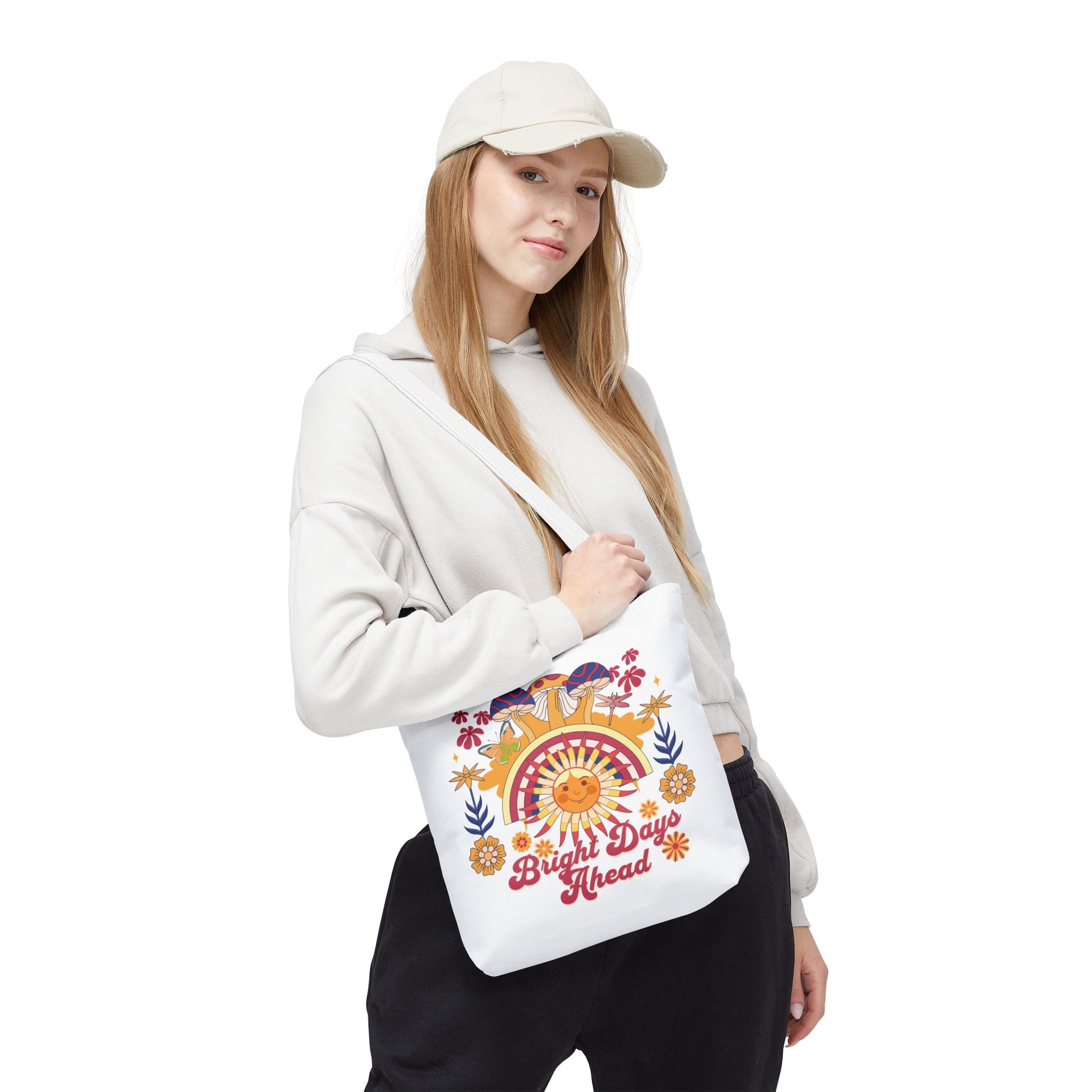 Bright Days Ahead Sunshine Floral Tote Bag with cheerful sunshine, flowers, and butterflies design. Ideal for outdoor adventures, this durable polyester bag features reinforced handles, boxed corners, and comes in various sizes.