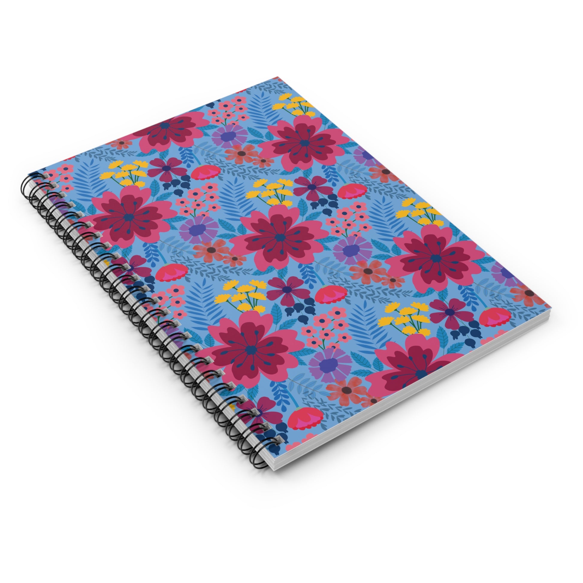 Floral Spiral Notebook with vibrant pink, magenta, and yellow blooms on a bright blue cover, featuring a black double-loop wire binding for easy page turning, embodying FireBrook Designs' joyful and uplifting style.