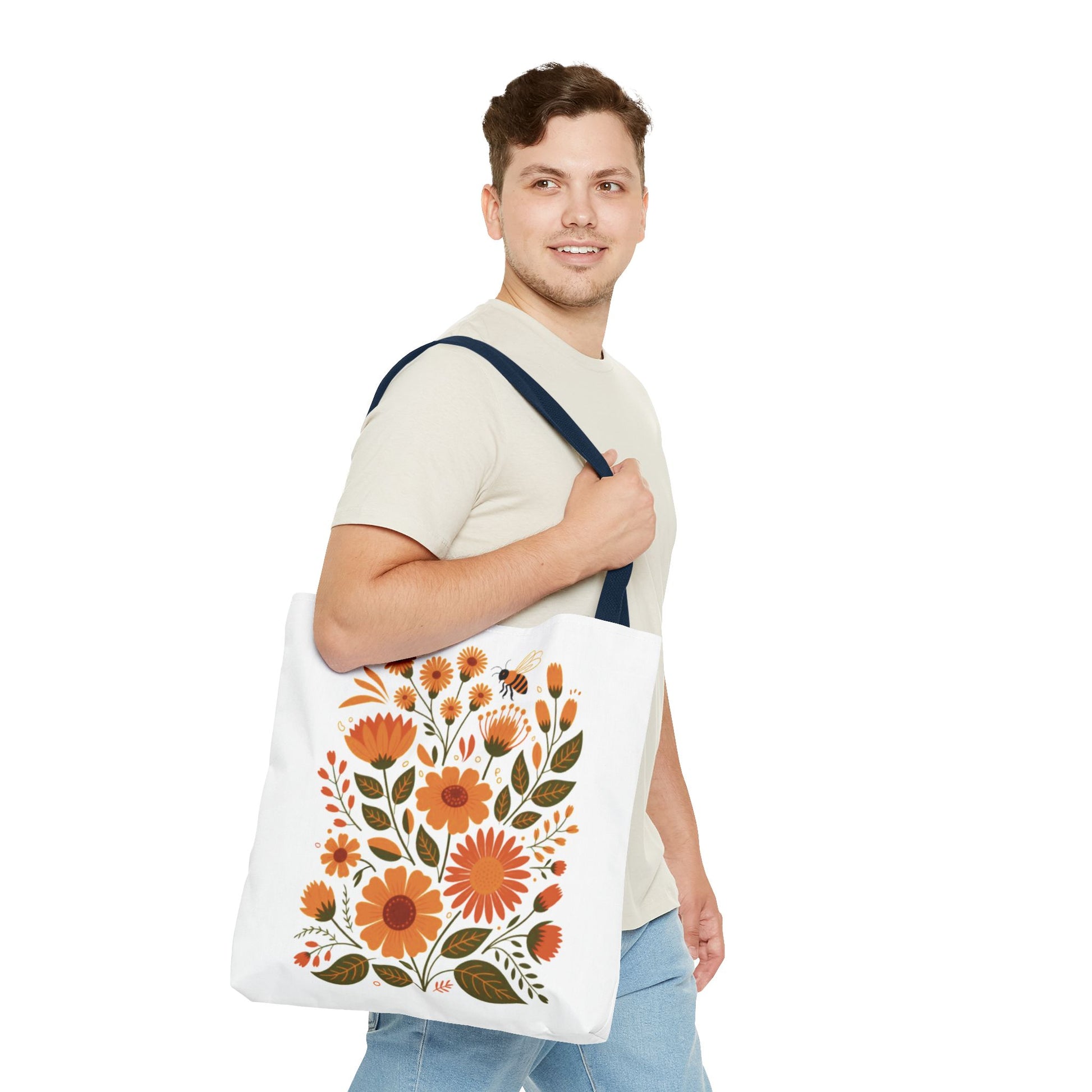 Folk Floral Tote Bag showcasing hand-drawn wildflowers in warm tones, ideal for nature lovers. Made of durable polyester with reinforced handles, perfect for everyday use. Available in multiple sizes.