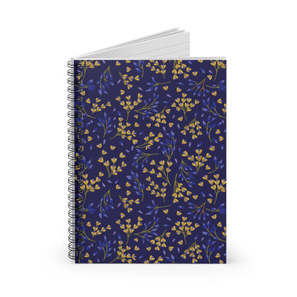 Floral Spiral Notebook with a dark blue cover and yellow-purple leafy sprigs, featuring sleek metal binding and blank white pages, ideal for creative journaling or note-taking. Compact and eco-friendly design.