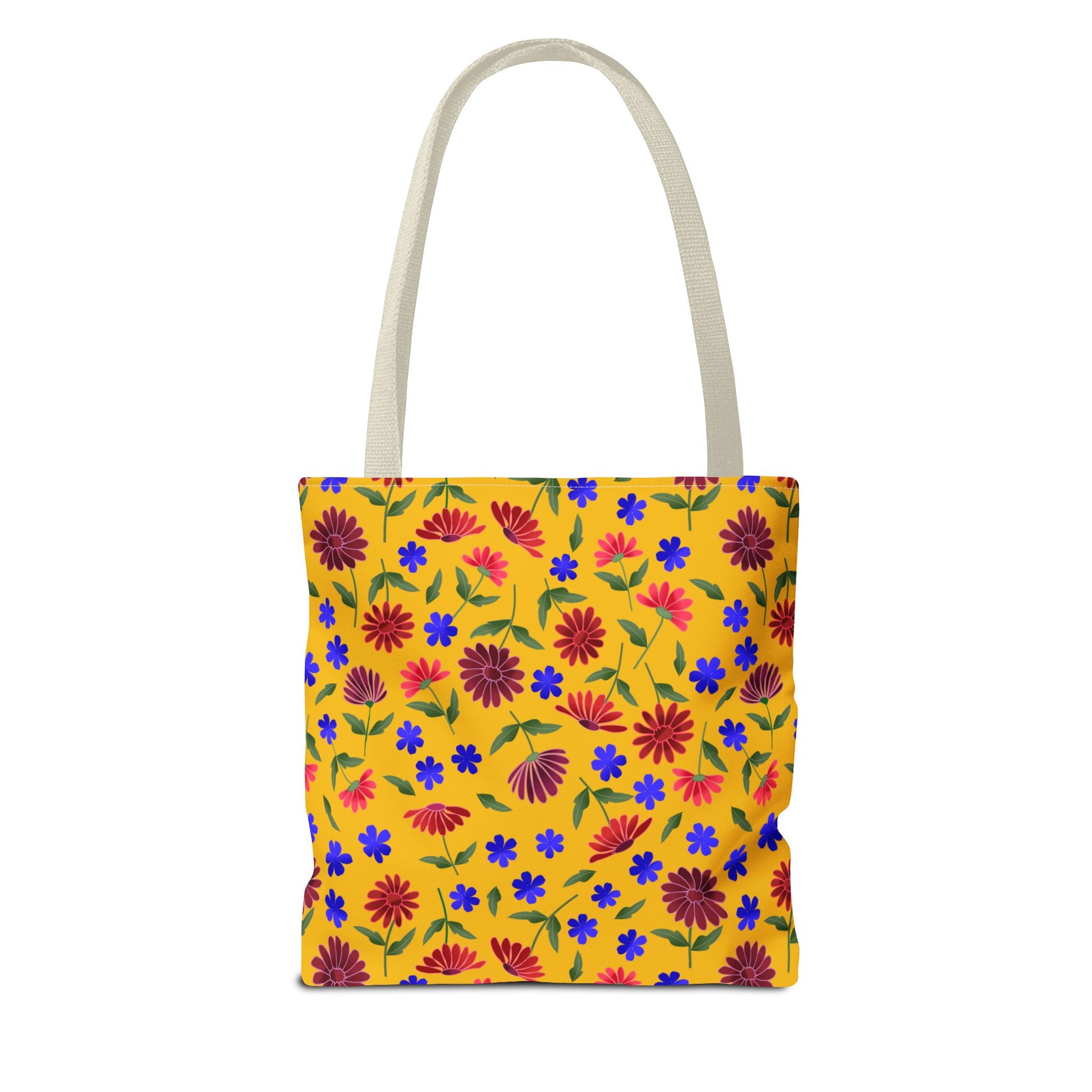 Golden Wildflower Tote Bag with vibrant red and blue flowers against a yellow canvas. Features natural-colored straps and a spacious, reinforced design, embodying FireBrook Essentials' joyful, everyday practicality.
