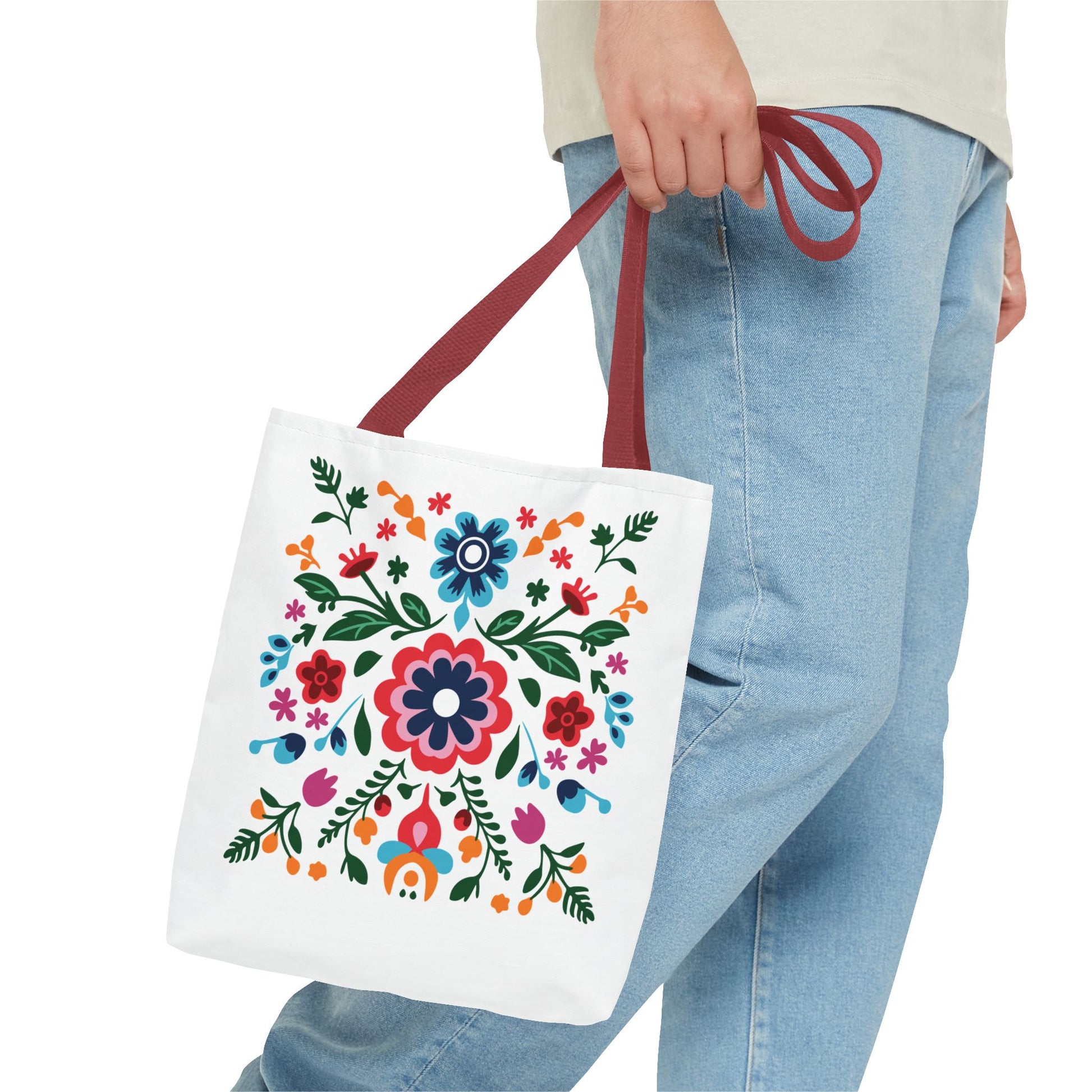 Floral Tote Bag held by a person, featuring a vibrant floral pattern, ideal for stylish, everyday use.