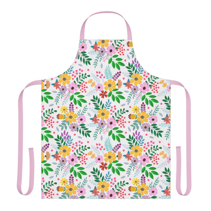 Floral Apron from FireBrook Designs showcases a vibrant hand-drawn floral pattern, featuring colorful blossoms and green leaves on a soft polyester canvas with pale pink neck and side ties, offering stylish, stain-free protection.
