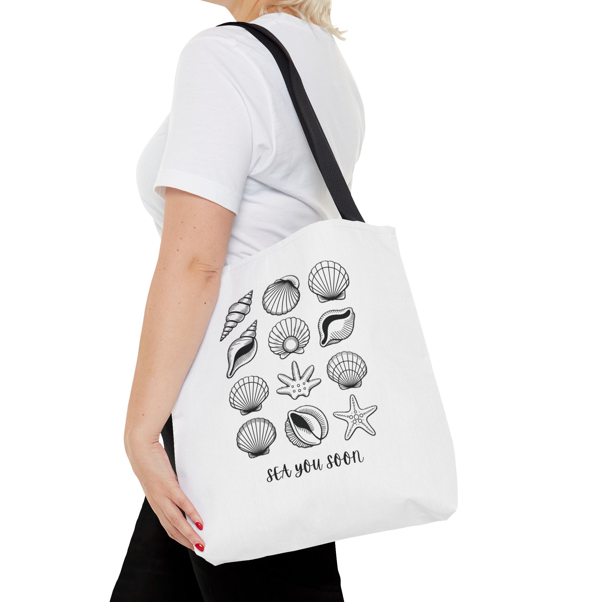 Sea Shells Tote Bag showcasing a beachy vibe, crafted from durable polyester with reinforced stitching and boxed corners, perfect for seaside adventures. Available with five color handle options. Ideal for beach lovers.