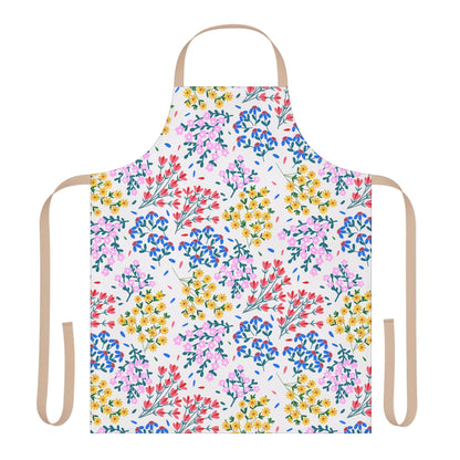 Floral Apron by FireBrook Designs, featuring a vibrant scattered floral pattern on a white background. This full-coverage, stain-free apron includes beige ties, offering comfort and style for cooking or crafting.