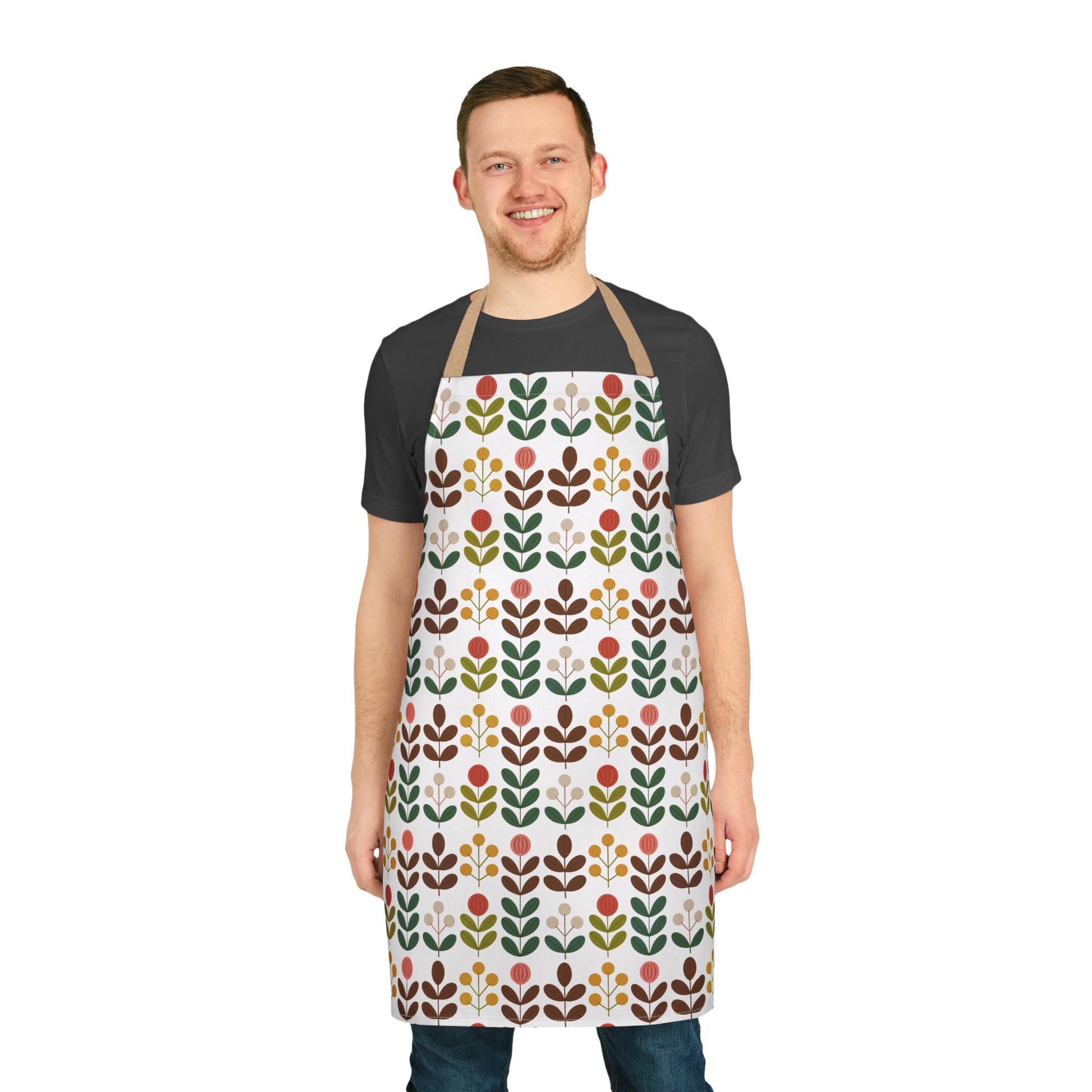 Flower Pattern Apron showcased on a smiling man, highlighting its creative floral design ideal for cooks or artists. The apron combines vibrant style with practicality, perfect for joyful kitchen or studio activities.