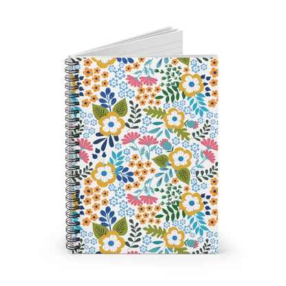 Floral Spiral Notebook featuring a vibrant floral cover with stylized flowers and green leaves, showcasing its sleek metal spiral binding and plain white pages, perfect for inspiring creativity and organization.
