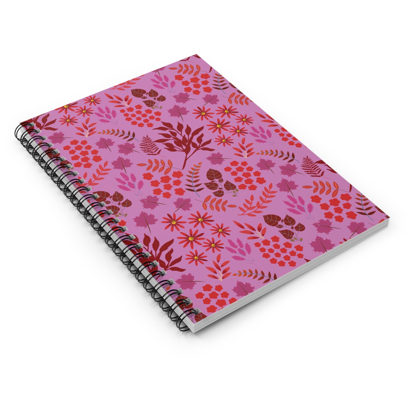 Floral Spiral Notebook with botanical motifs on a bright pink cover, featuring a durable black metal coil binding for easy page turning. Ideal for creative expression and organized note-taking.