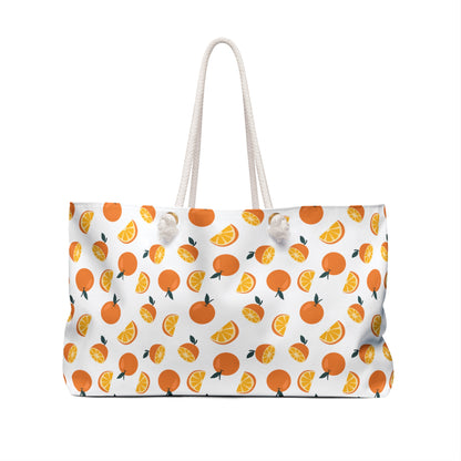 Weekender Bag Orange Pattern Design Travel Tote with playful orange motif, ideal for vibrant, stylish getaways. Features durable polyester, cotton rope handles, and spacious T-bottom design from FireBrook Essentials.