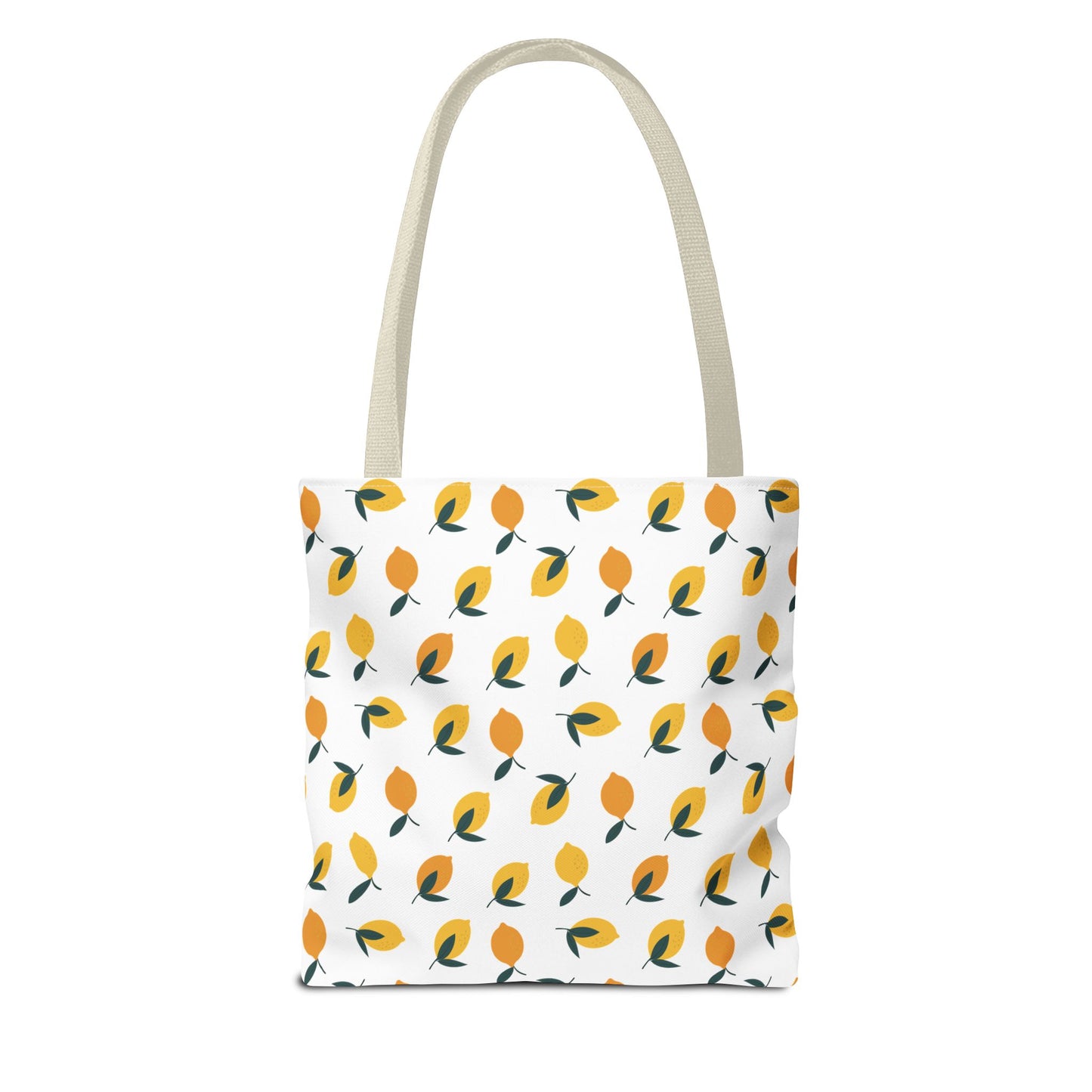 Lemon Drop Toss Tote Bag features a vibrant lemon pattern with green leaves on a white background, offering a refreshing, cheerful style perfect for summer outings and everyday use.