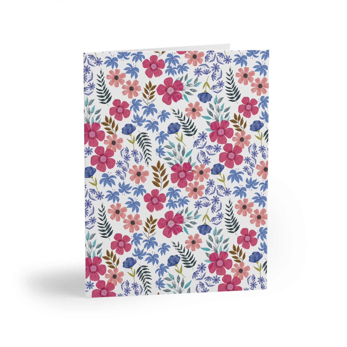 Floral Wildflower Greeting Cards — Pack of 8/16/24 features a vibrant watercolor floral pattern, conveying a fresh, springtime energy. Ideal for heartfelt messages, each card comes with a matching envelope.