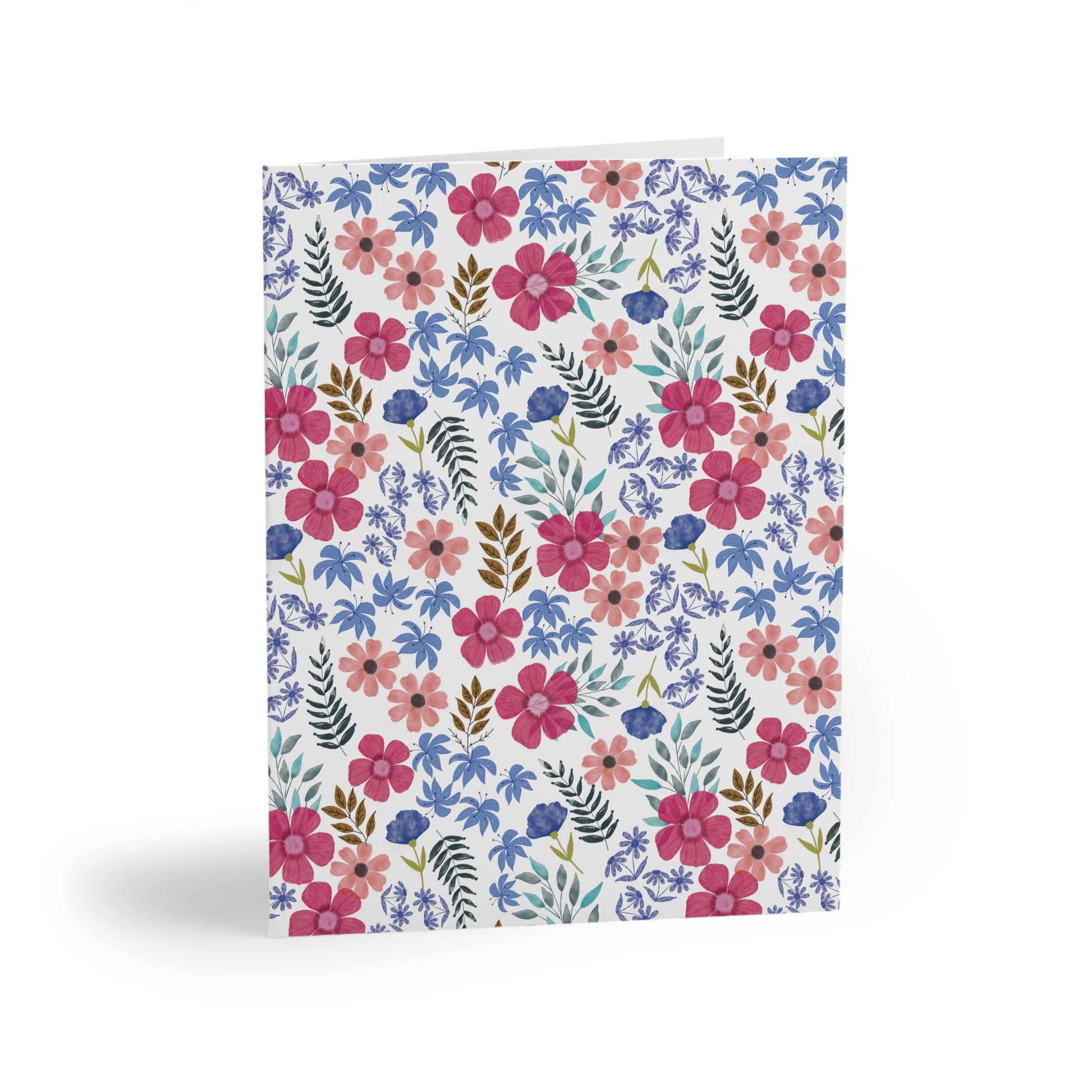 Floral Wildflower Greeting Cards — Pack of 8/16/24 features a vibrant watercolor floral pattern, conveying a fresh, springtime energy. Ideal for heartfelt messages, each card comes with a matching envelope.