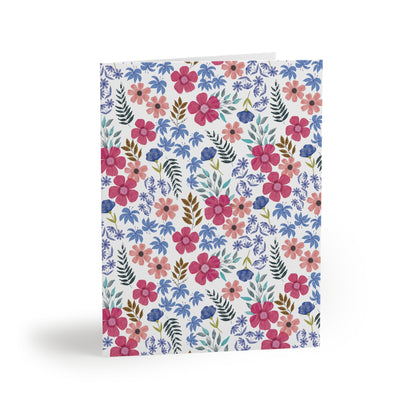 Floral Wildflower Greeting Cards — Pack of 8/16/24 features a vibrant watercolor floral pattern, conveying a fresh, springtime energy. Ideal for heartfelt messages, each card comes with a matching envelope.