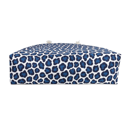 Weekender Bag Blue Cheetah Print, featuring a stylish blue and white camouflage pattern, perfect for quick getaways with its spacious design and durable cream-lined interior, ideal for fashion-forward travelers.