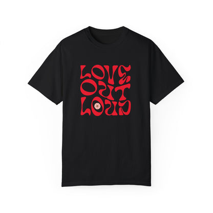 Love Out Loud T-Shirt: This unisex, garment-dyed tee features the LOVE OUT LOUD design, showcasing a relaxed fit and crew neckline, ideal for expressing individuality in a casual, stylish manner.