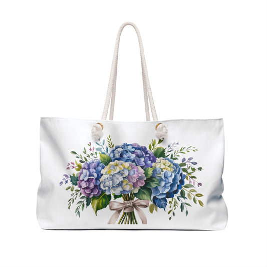 Weekender Bag - Hydrangea Bouquet: A stylish tote featuring a vibrant hydrangea floral design, showcasing rope handles and a spacious T-bottom, ideal for travel and weekend getaways.