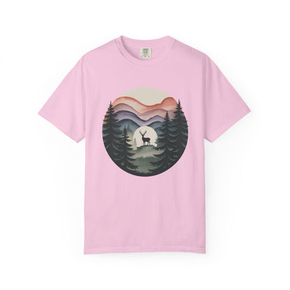 The Nature Wanderer T-Shirt showcases a serene sage-green design with indigo-to-lavender mountain silhouettes and a minimalist stag, ideal for nature lovers seeking comfort and tranquility.
