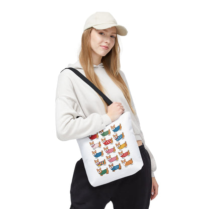 Cheerful Corgi Cartoon Style Dog Lover Tote Bag featuring cute corgis in playful outfits, showcasing a whimsical vector design. Ideal for dog enthusiasts seeking a durable, stylish accessory for everyday use.