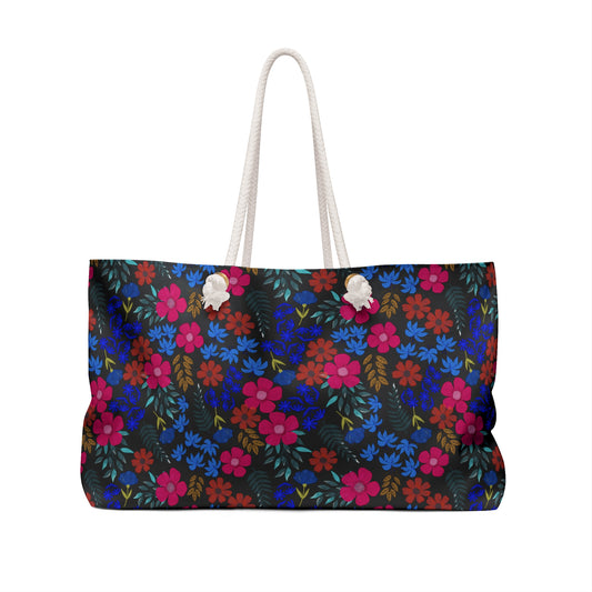 Weekender Bag with vibrant floral pattern, featuring off-white rope handles and a spacious design, ideal for stylish travel.