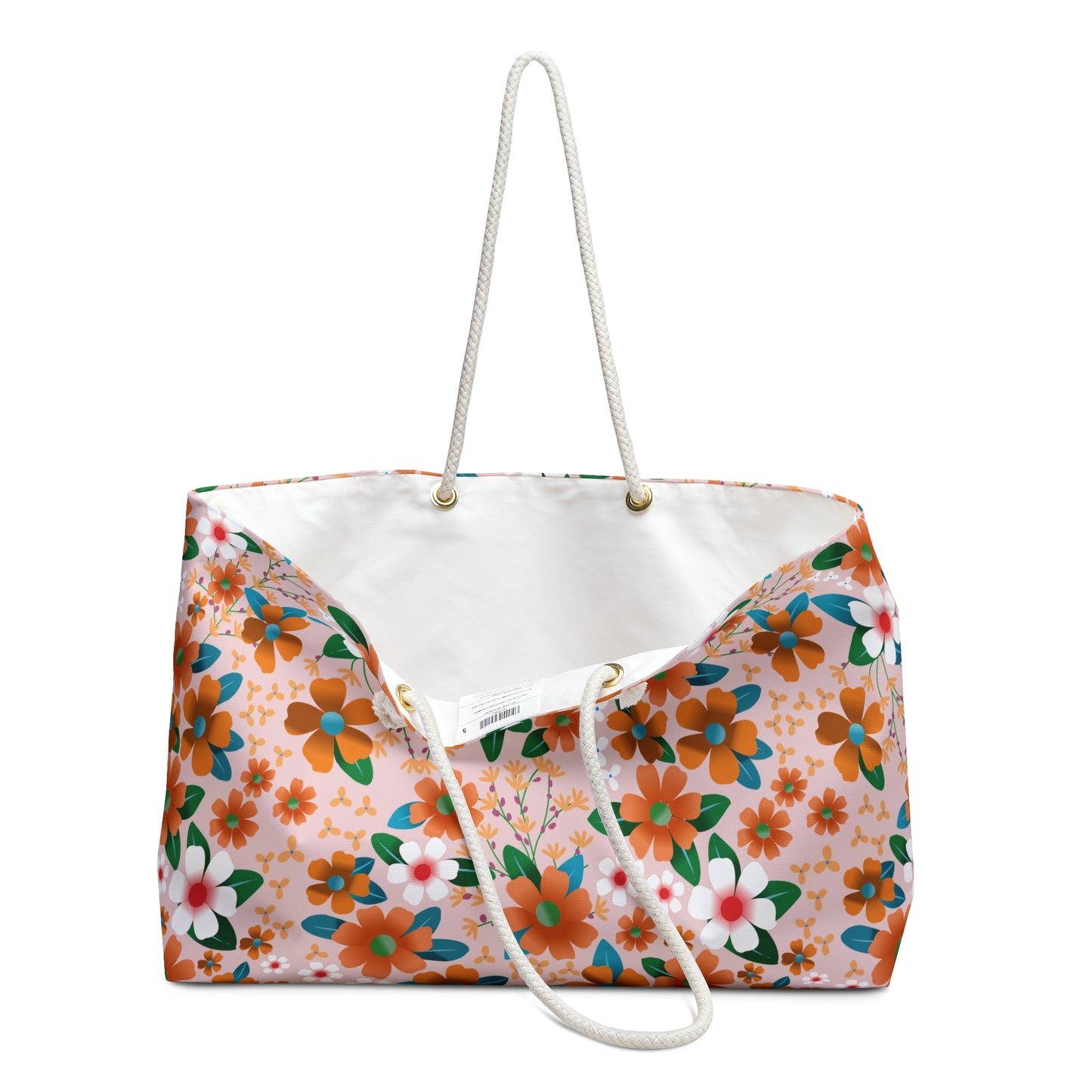 Weekender Bag featuring a vibrant floral pattern with orange and teal blossoms on a pale peach background, complemented by sturdy rope-style shoulder straps, perfect for stylish and joyful travel adventures.