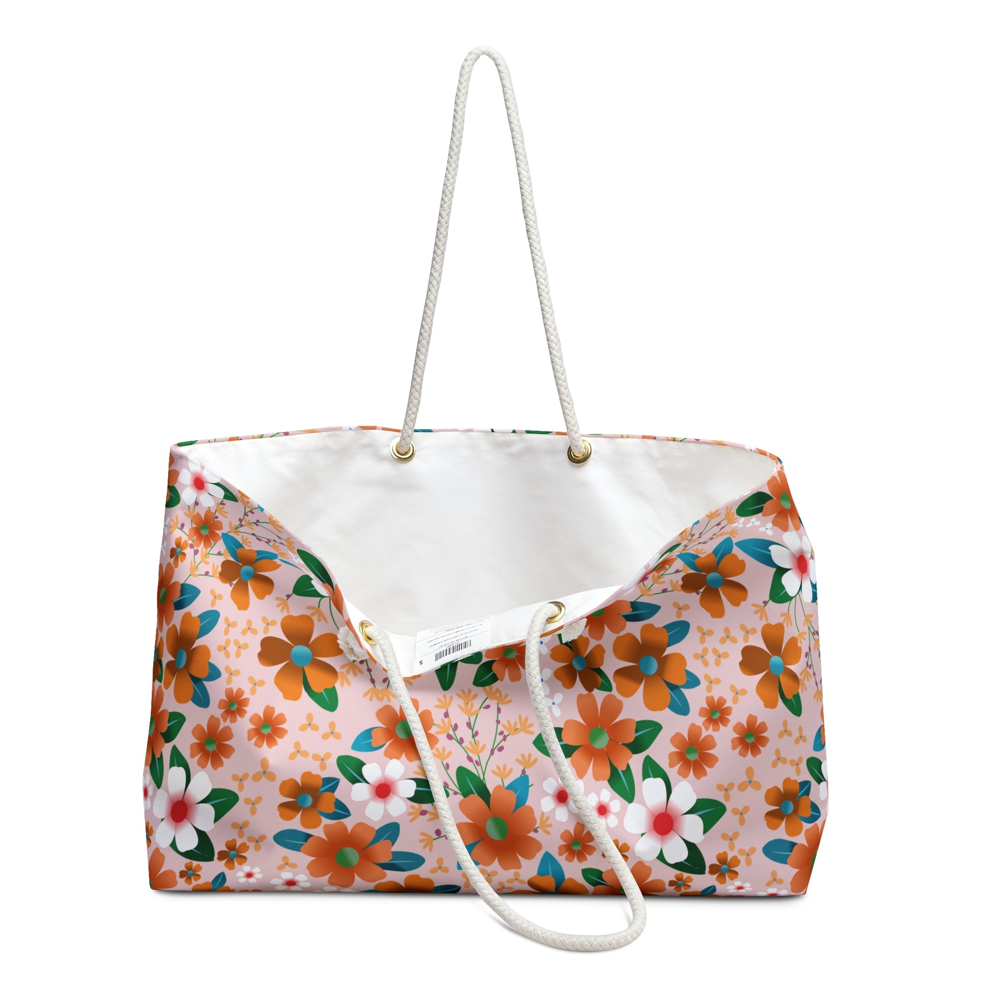 Weekender Bag featuring a vibrant floral pattern with orange and teal blossoms on a pale peach background, complemented by sturdy rope-style shoulder straps, perfect for stylish and joyful travel adventures.